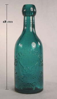 Cottle & Post, Portland, Oregon soda bottle in deep blue green; click to enlarge.