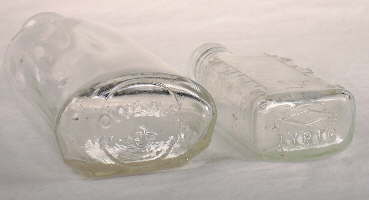 20th century machine-made "oval" druggist bottles; click to enlarge.
