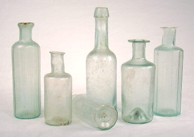 Grouping of 1850s era generic medicine bottes; click to enlarge.