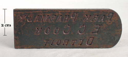 Photo of an original plate for a plate mold dating from the early 20th century.